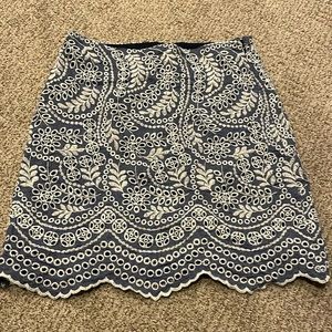 Loft summer skirt. Eyelet detail; chambray background.